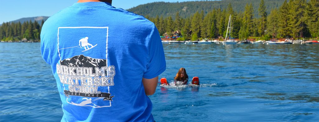 Birkholm's Waterski School Lake Tahoe t shirt with water skiing student.